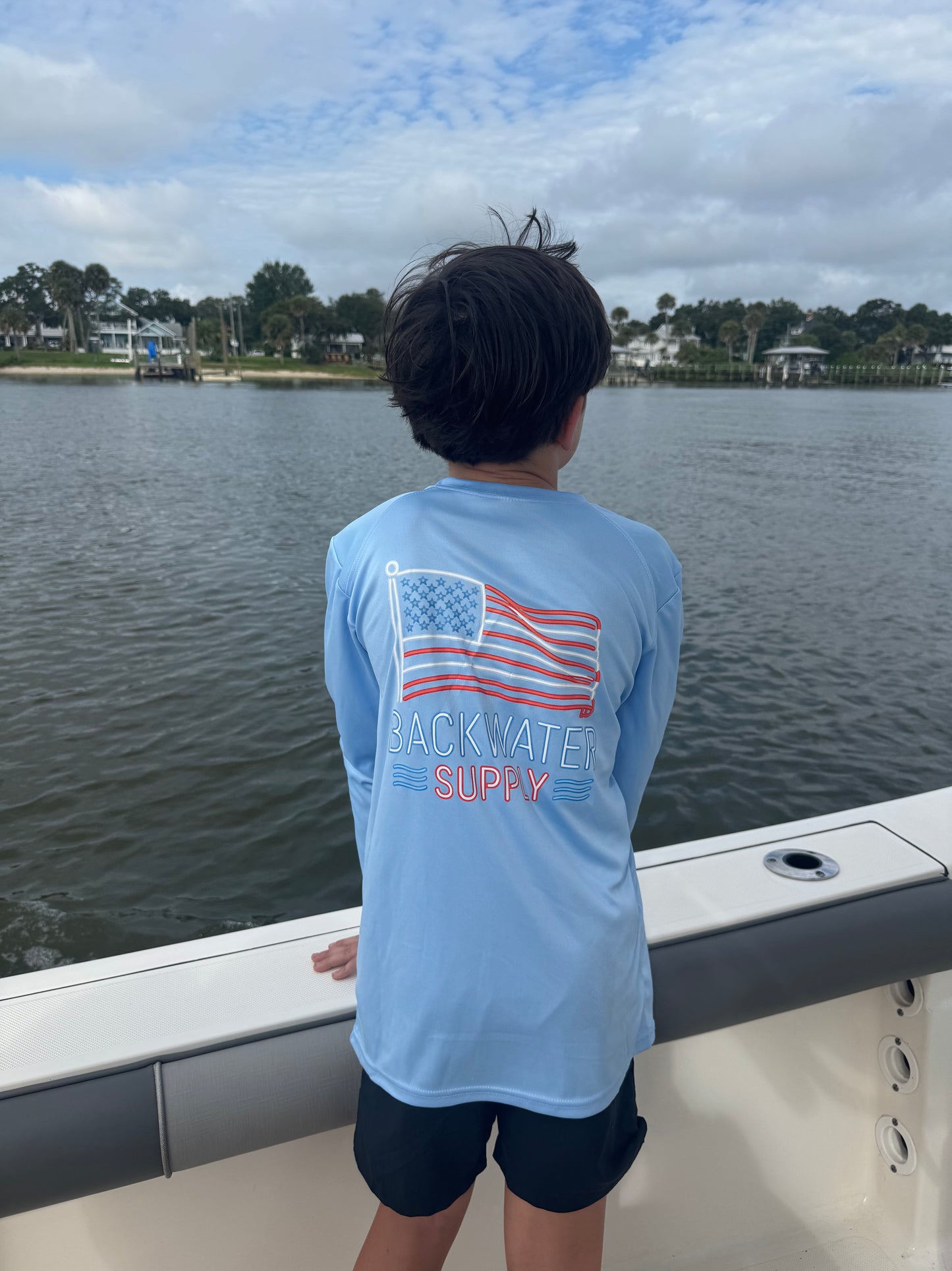 Youth Backwater Supply Performance Shirt - Neon Flag Design