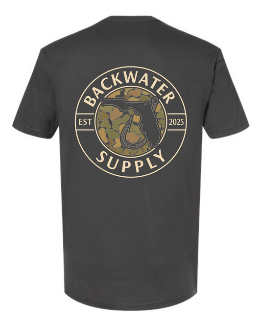 Youth Backwater Supply – Camo Florida Seal Tee